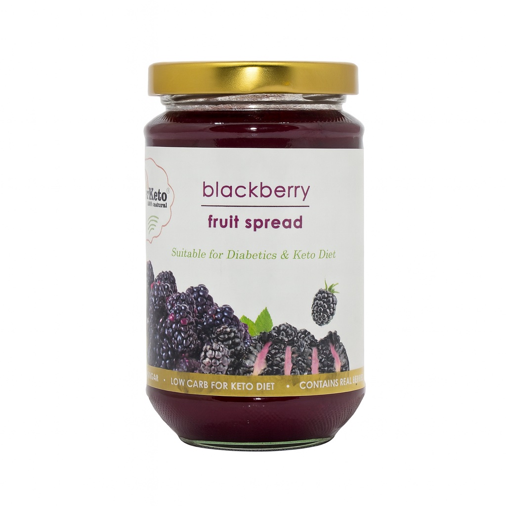 Blackberry fruit spread jar with fresh blackberries.